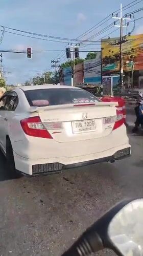 White Honda Civic spotted at Thailand traffic light