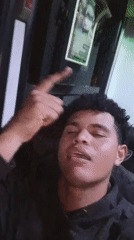 Man films selfie video in dark space in Juan Griego