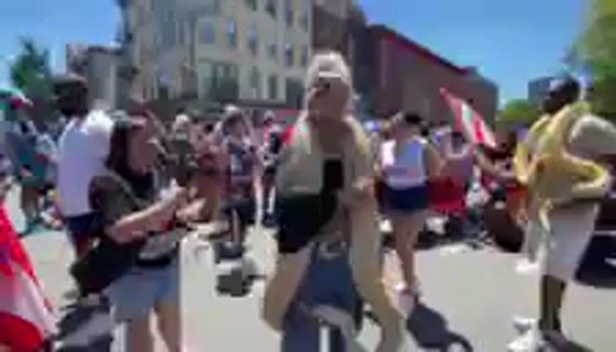 Puerto Rican street festival with python display in NYC