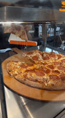Late-night pizza service documented at Birobidzhan Dodo Pizza location