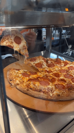 Late-night pizza service documented at Birobidzhan Dodo Pizza location