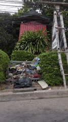 Electrical work and coastal scenery along Ko Samui streets