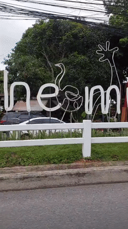 Electrical work and coastal scenery along Ko Samui streets