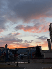 Sunset documented over Krasnoyarsk residential district, playground visible