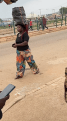 Morning street life unfolds in Bukuru, Nigeria market area
