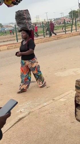Morning street life unfolds in Bukuru, Nigeria market area