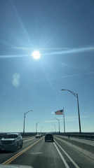 Traffic congestion reported on Rhinebeck bridge during sunny afternoon