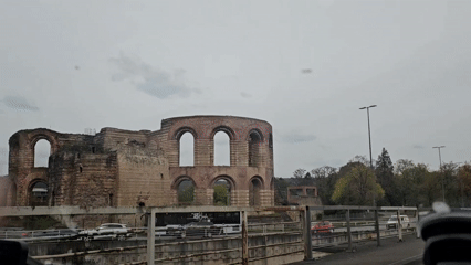 Drive-by footage captures Trier's historic basilica and dining mural