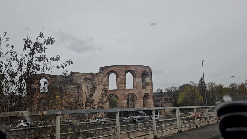 Drive-by footage captures Trier's historic basilica and dining mural