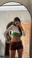 Woman takes mirror selfies in North Kuta early morning