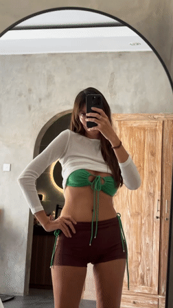 Woman takes mirror selfies in North Kuta early morning
