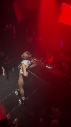 White-clad performer draws crowd at Milan nightclub Viper