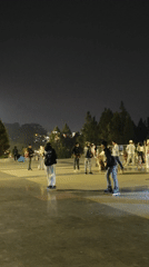 Nighttime plaza activities captured at Da Lat's Lam Vien Square