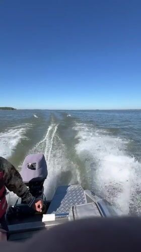 Speeding across open water near Beregovoe, Russia