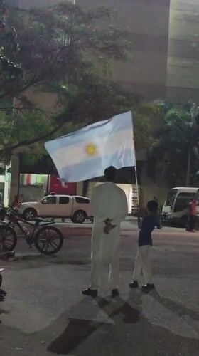 Argentine flag celebration in the streets of Dhaka at night