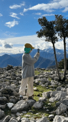 Hikers photograph scenic Bay of Kotor views from Montenegro mountains