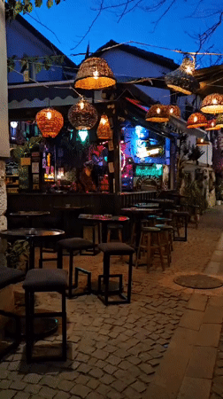 Evening street scenes documented across historic Seferihisar, Turkey