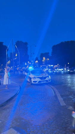 Moroccan flag-waving celebration spills onto Paris streets at dusk