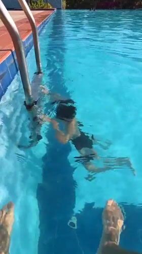 Children swimming at pool in Phu Thuy Ward, Vietnam