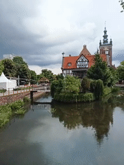 Canal views and phone photography near St. Mary's, Gdańsk