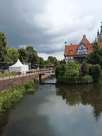 Canal views and phone photography near St. Mary's, Gdańsk
