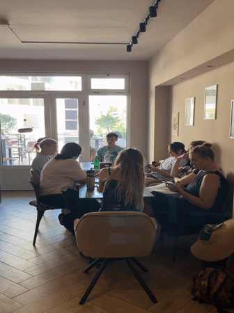 Card game gathering at Montenegro cafe