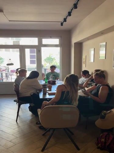 Card game gathering at Montenegro cafe