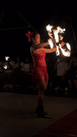 Fire dancers and musicians perform nighttime show in Denpasar