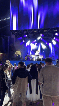 Rainy outdoor concert night in Estosadok, Russia