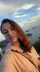 Tourist documents scenic hike and sunset views in Karon