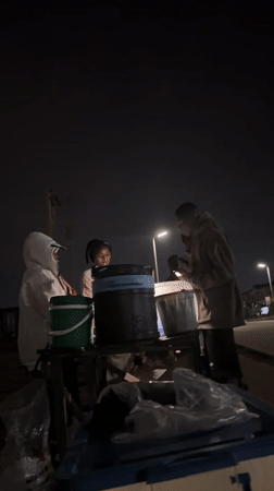 Late-night gathering in Jos with cash changing hands