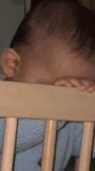 Father and baby share quiet afternoon moments at home