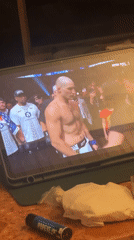 Early morning UFC viewing session captured on tablet in Paris