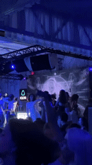 Late-night club scene in Varna, blue lights and live visuals
