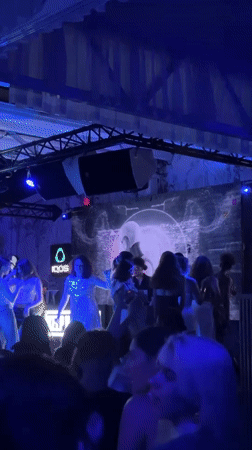 Late-night club scene in Varna, blue lights and live visuals
