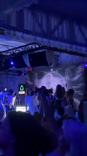Late-night club scene in Varna, blue lights and live visuals