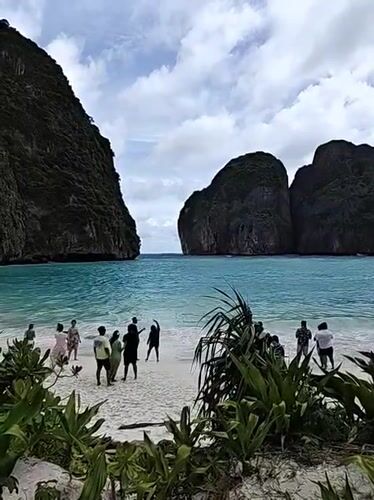 Ao Nang beach and boardwalk on a clear day