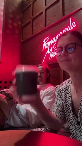 Red-lit bar night in Izhevsk, disco balls and green drinks