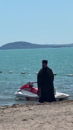 Orthodox priest performs blessing ritual on Bulgarian beach
