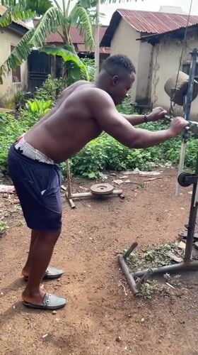 Men workout at makeshift outdoor gym in Akwanga, Nigeria