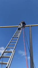 Man climbs ladder to reach elevated bar in Sarapul
