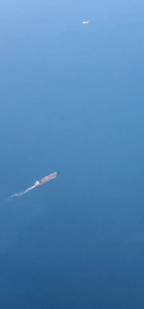Aerial views captured over Serik waters show ships, aircraft