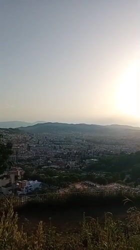 Barcelona sunset panoramas from the hills, Sagrada Família on the horizon