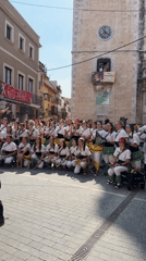 Traditional street festival and caramelized pineapple prep in El Vendrell