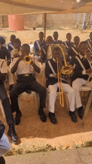 Brass band performs for uniformed gathering in Sabon Tasha