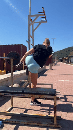 Woman lying near exercise equipment in Montenegro morning scene