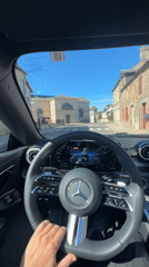 Behind the wheel of a Mercedes in rural Normandy