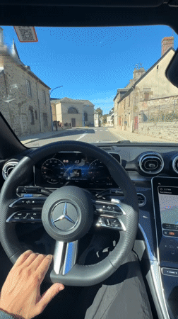 Behind the wheel of a Mercedes in rural Normandy
