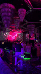 Late-night at a Milan nightclub, inside and out