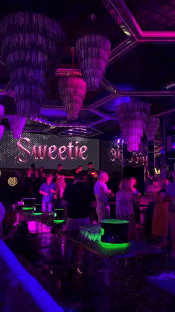 Late-night at a Milan nightclub, inside and out
